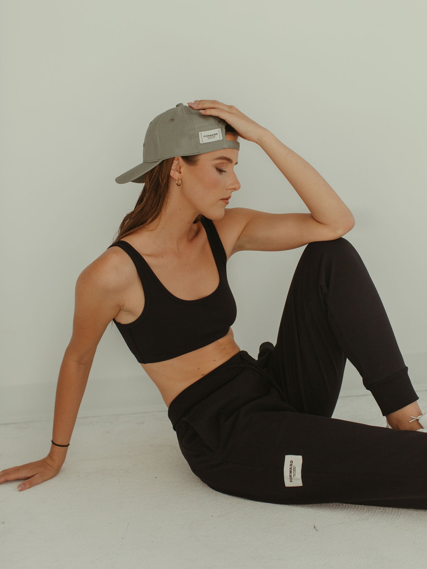 monochrome sage ball cap and black jogger sweat pant