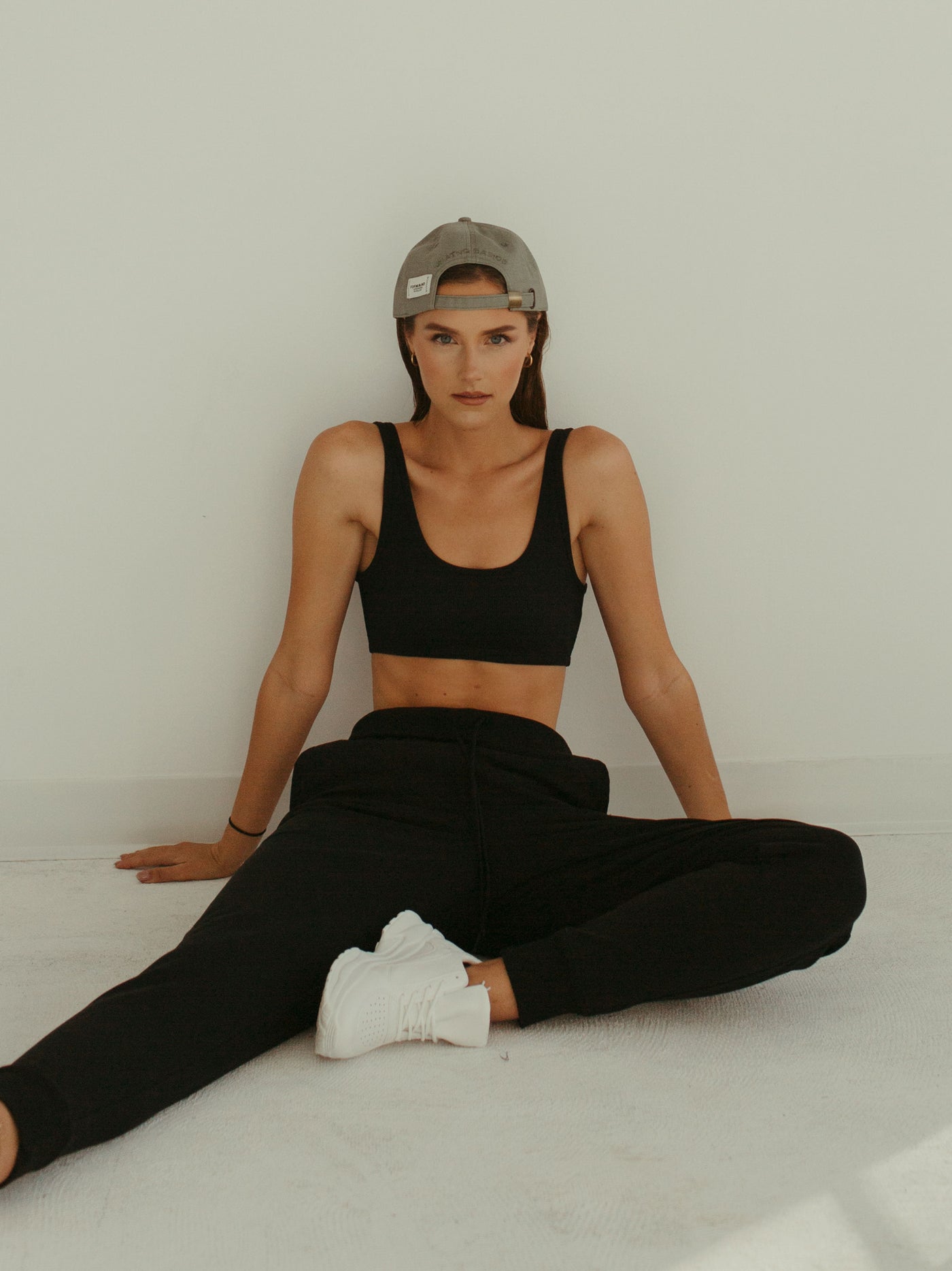 monochrome sage ball cap and black jogger sweatpant