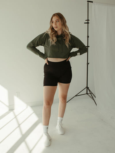 sage cropped hoodie with brand logo and embroidery detail with biker shorts