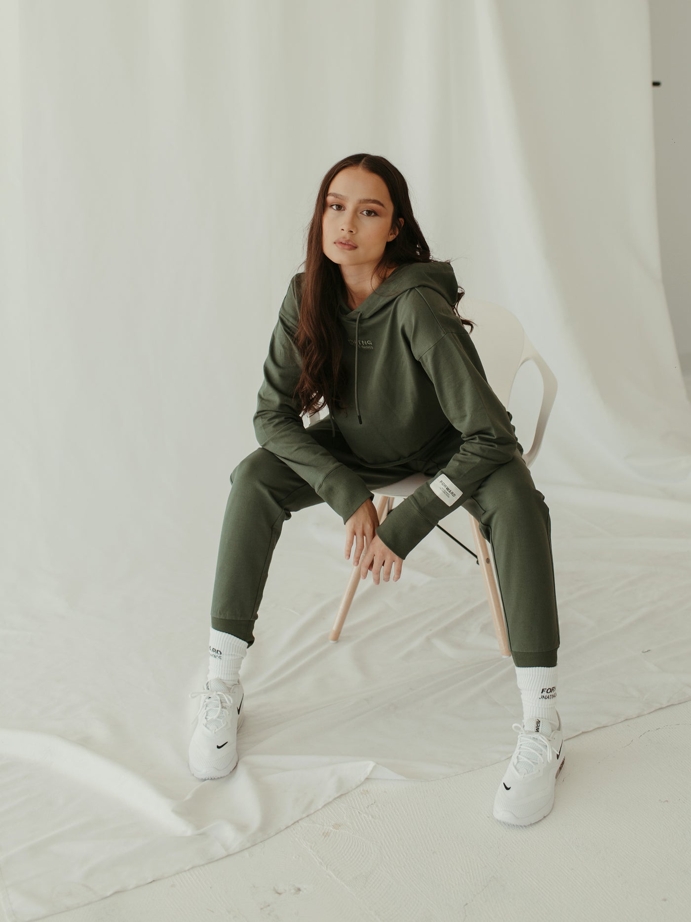 sage cropped hoodie with brand logo and embroidery detail with jogger sweatpant monochrome outfit