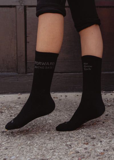 black crew socks with woven brand logo 