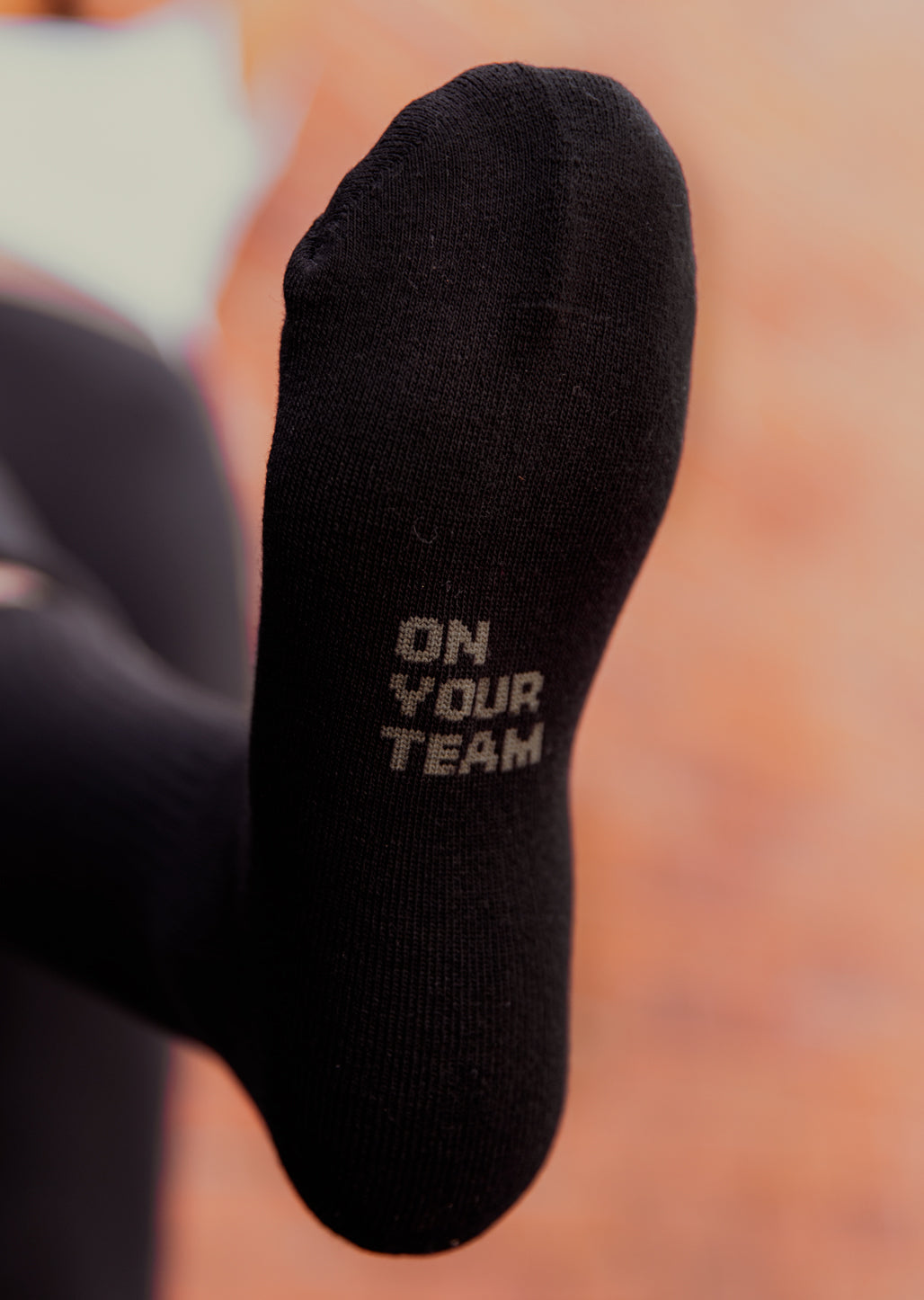 black crew socks with woven on your team detail 