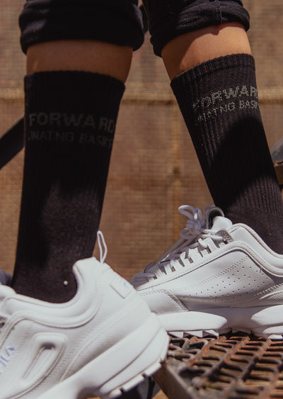 black crew socks with woven brand logo 